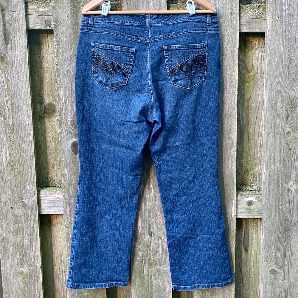 Boot cut jeans with sequin back pockets